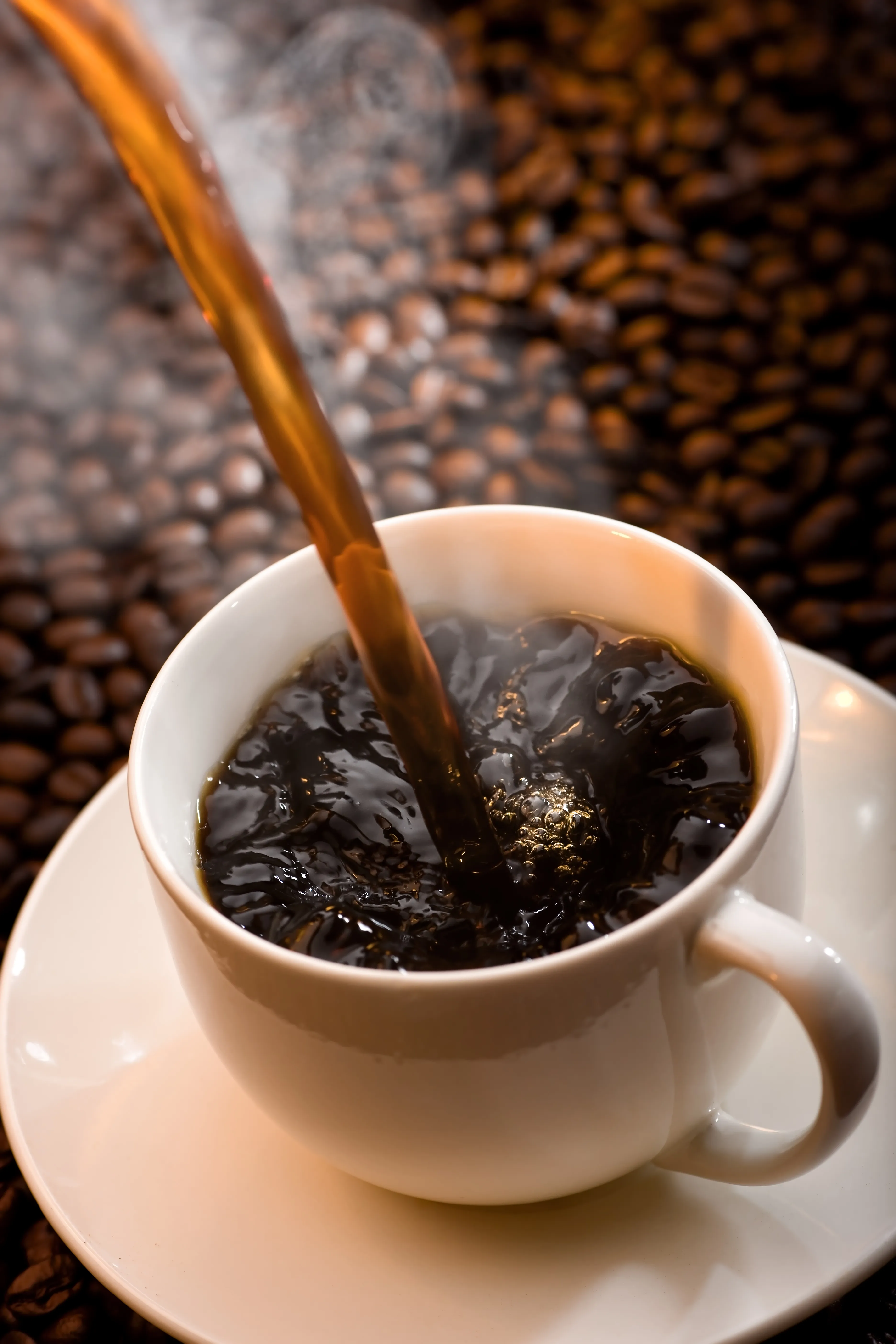 Hot Organo Health Coffee Pouring into Mug