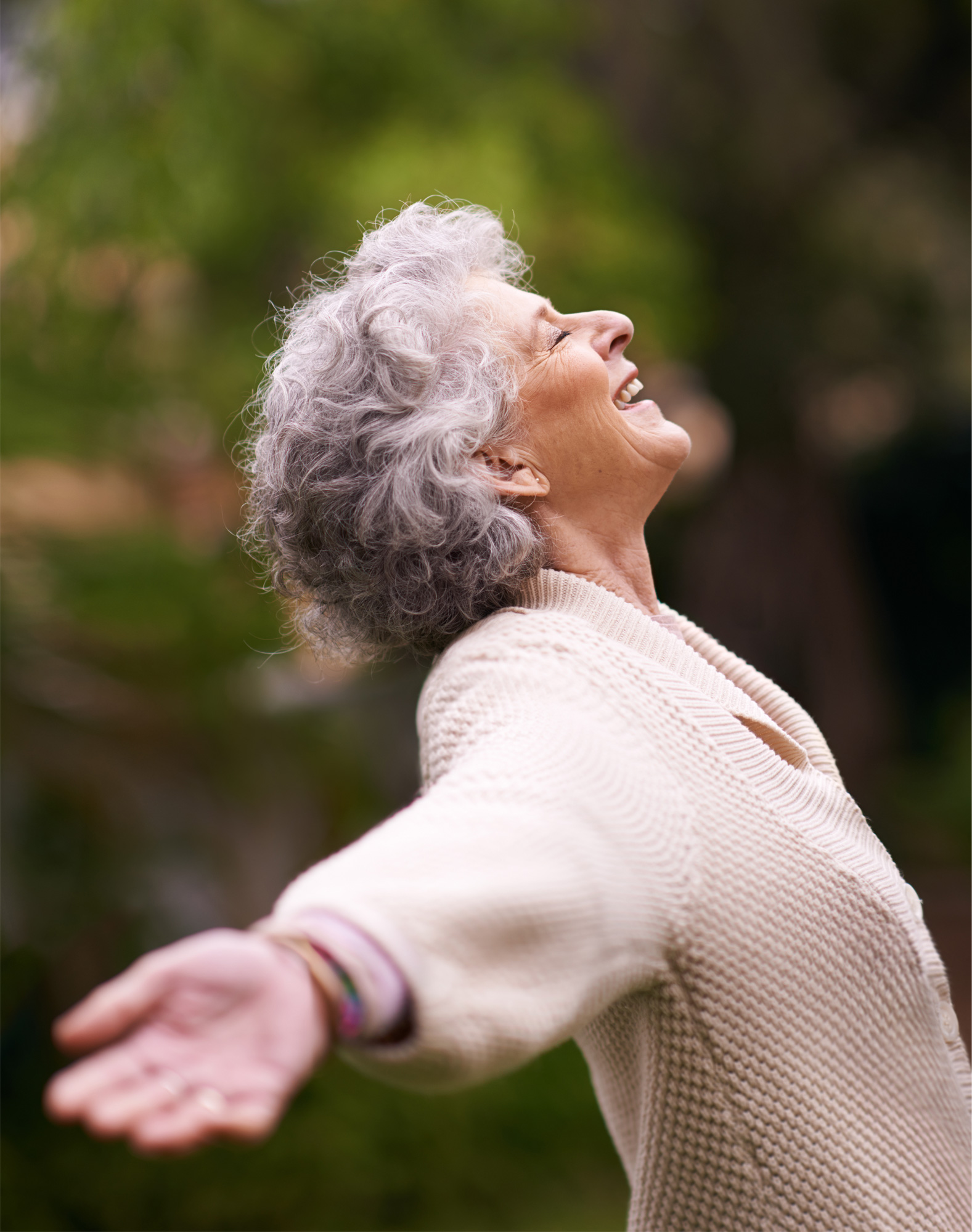 Happy senior woman, over 50, showing with vitality and health