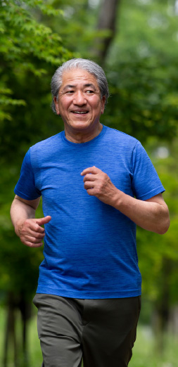 Man running for exercise, increasing optimal health in later life